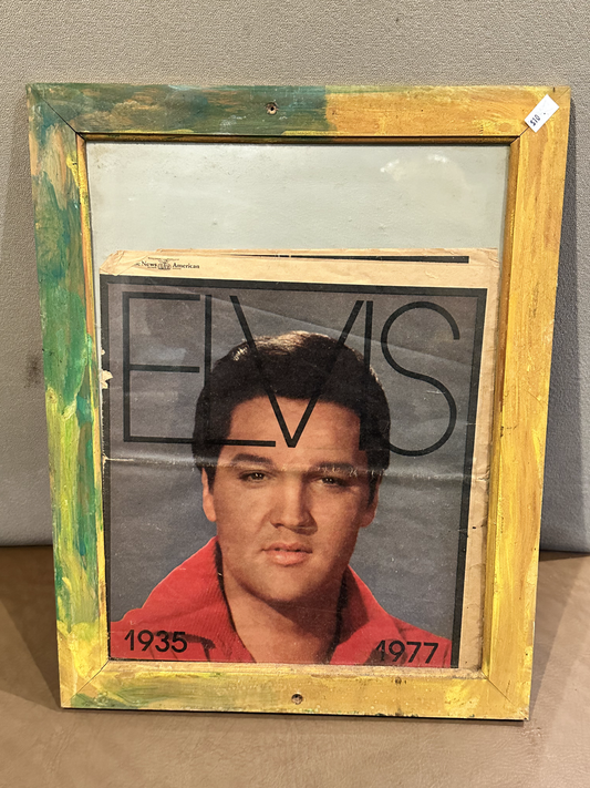 Elvis framed newspaper. News America